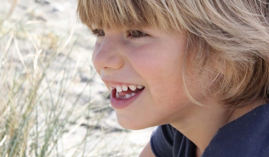 little boy laughing