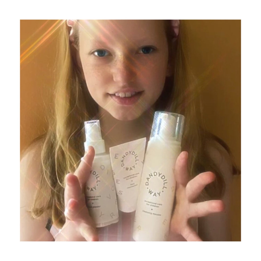 girl holds best sensitive skin product cleansing mousse