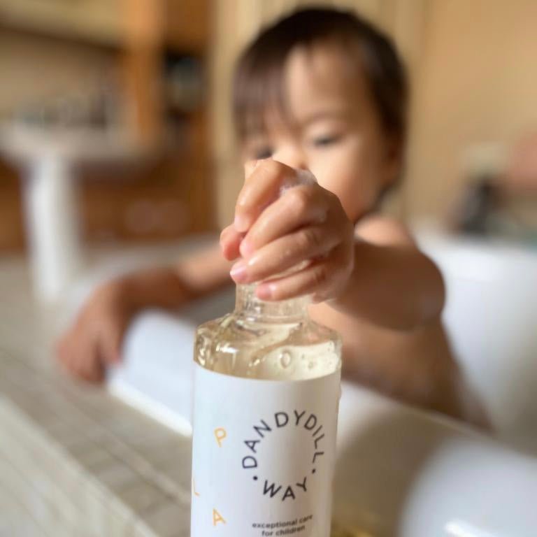 Little girl enjoying SLS-free, natural bubble bath